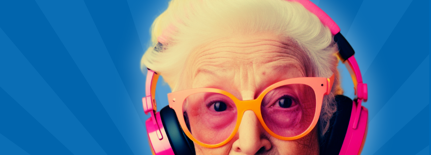 Eine ältere Frau trägt große Kopfhörer und einer pinkfarbenen Sonnenbrille